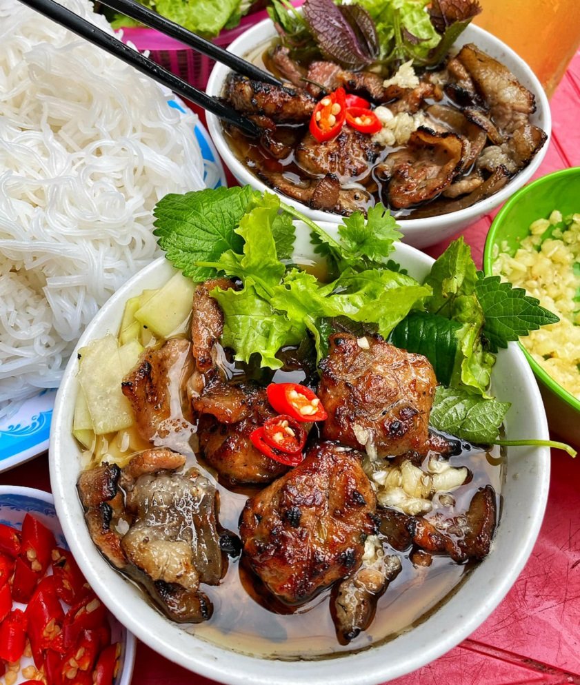 Bun cha with grilled pork, herbs and rice noodles, a Hanoi specialty