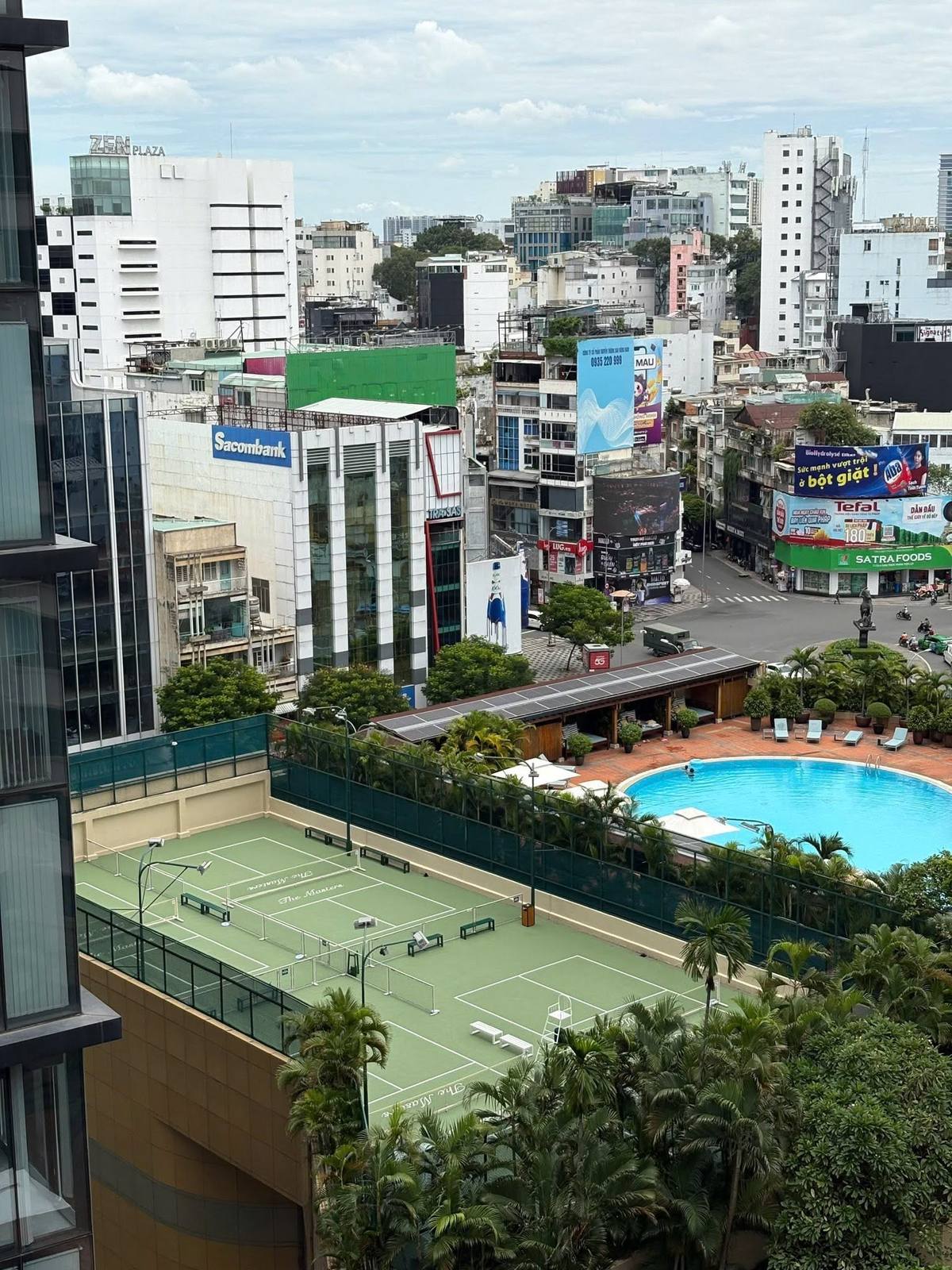 Rooftop courts at New World Saigon Hotel in District 1, home to Court One Club, overlooking the city skyline