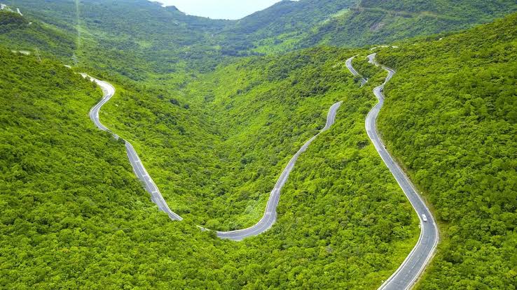 The winding Hai Van Pass road above the sea north of Da Nang
