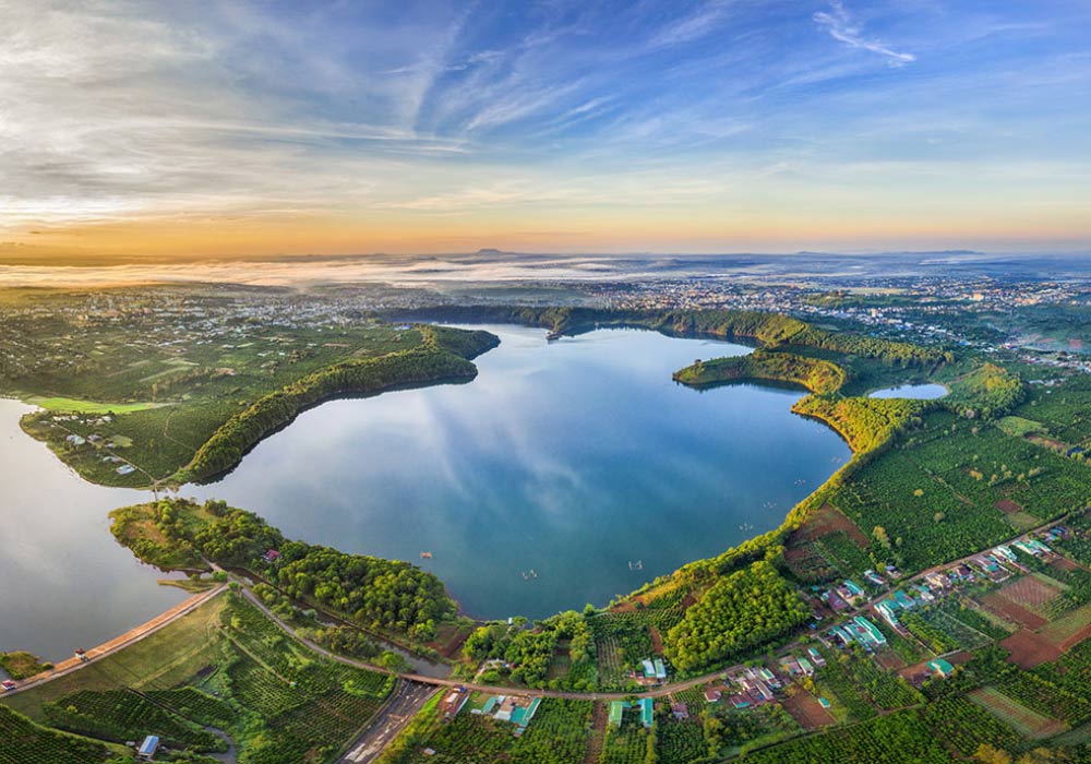 Bien Ho lake, a volcanic crater lake surrounded by pine trees near Pleiku, Gia Lai