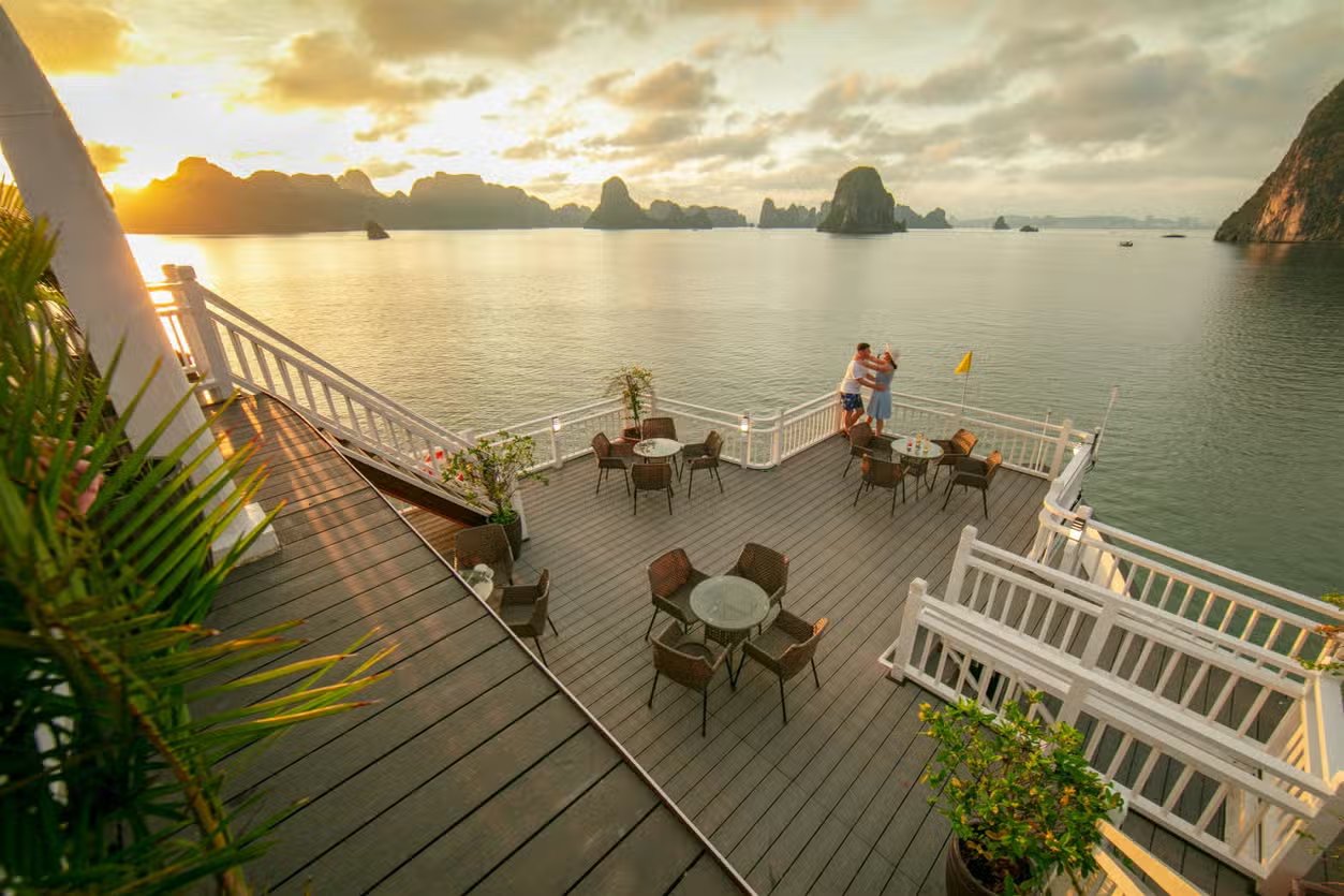 Sunrise seen from the deck of a cruise ship anchored in Ha Long Bay