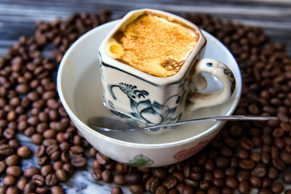 A cup of hot egg coffee in a Hanoi cafe on a cold December day