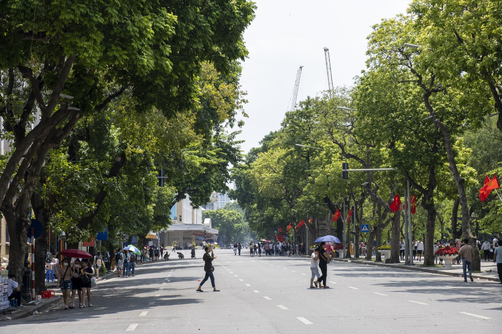 A street in Hanoi's Old Quarter on a weekend with few motorbikes, after the 2026 petrol motorbike pilot ban