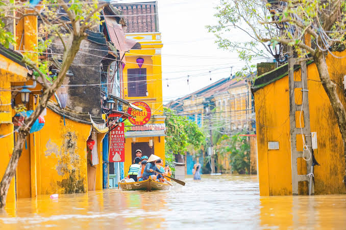 A flooded street in Hoi An old town during the November rainy season
