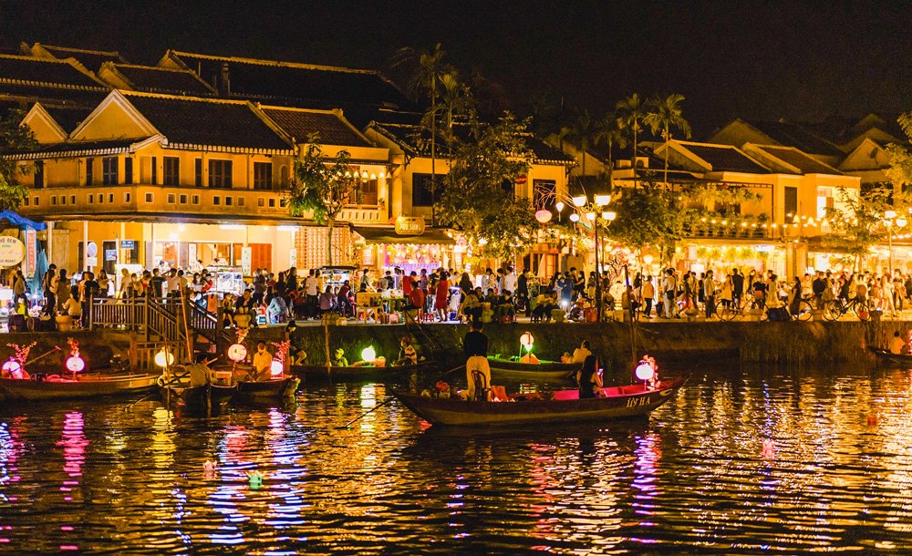 Lanterns floating on the Thu Bon River in Hoi An during the December full moon lantern night