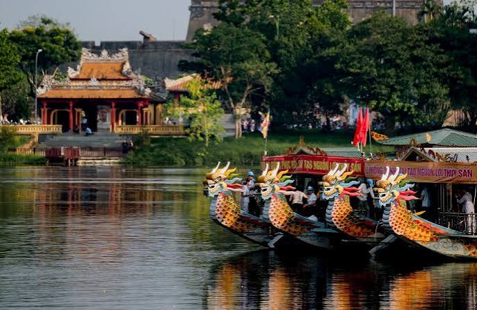 A dragon boat on the Perfume River in Hue in the late afternoon