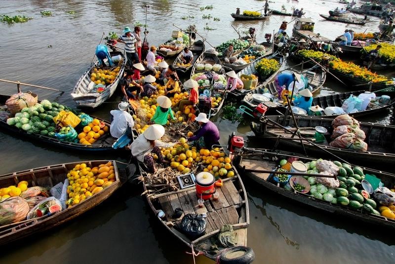 Boats at a floating market in the Mekong Delta on a dry December morning
