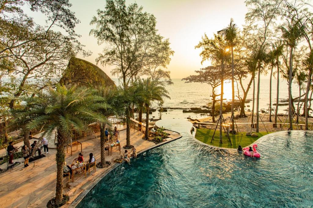 A quiet beachfront resort with palm trees at Ong Lang beach in Phu Quoc
