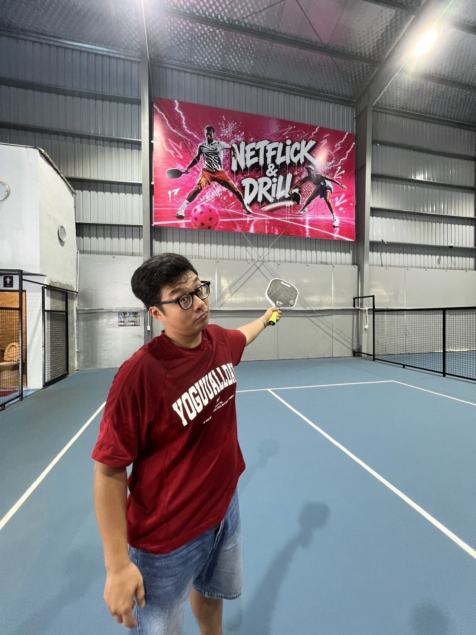 A local guide arranging a pickleball game for a traveller at a club in Vietnam