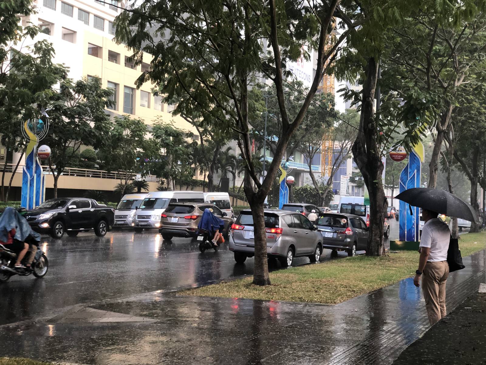 An afternoon tropical rain storm on a street in Ho Chi Minh City