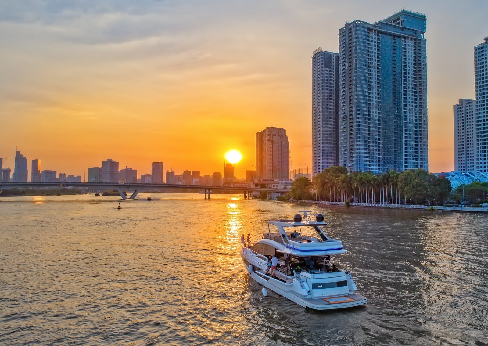 The Ho Chi Minh City skyline and the Saigon River at sunset