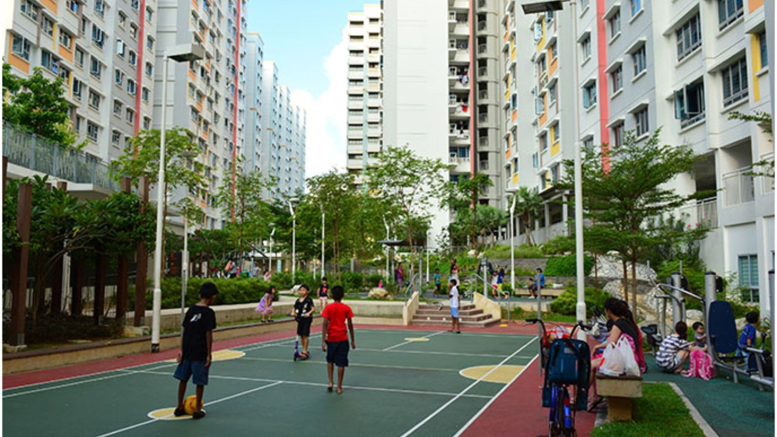 An outdoor pickleball court beside HDB blocks in Singapore