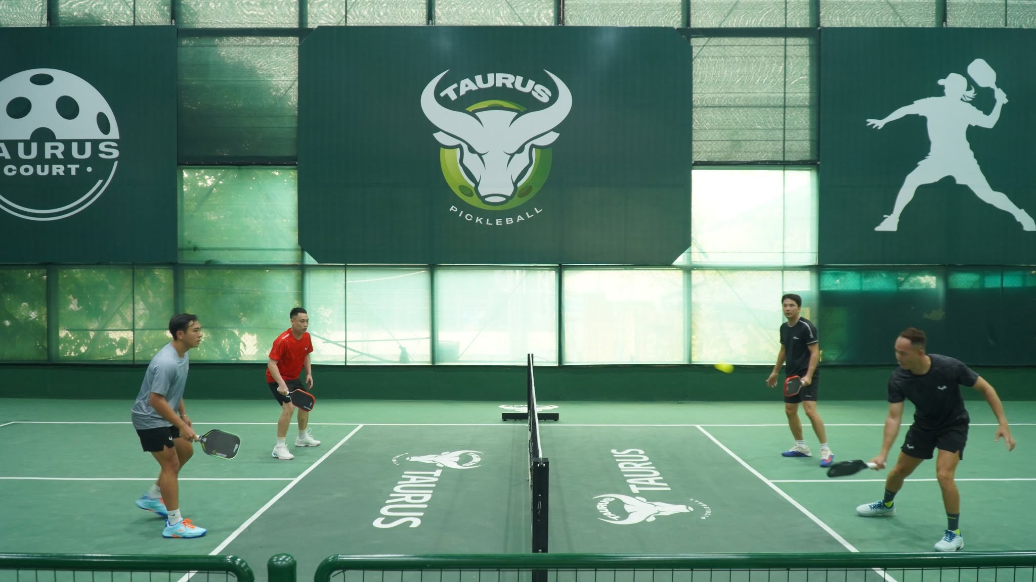 A doubles game on the indoor courts at Taurus Pickleball in Hanoi
