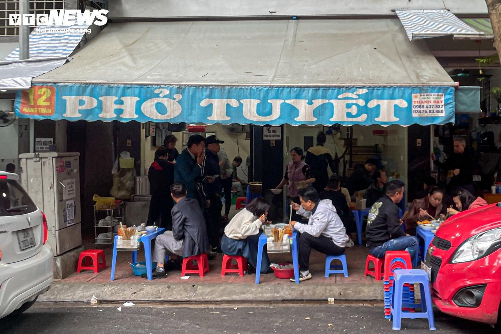Players eating pho at a street stall after a morning pickleball game in Vietnam