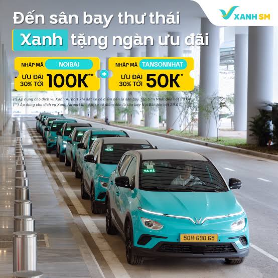 Green Xanh SM electric taxis lined up at the pickup area outside Noi Bai Airport arrivals in Hanoi