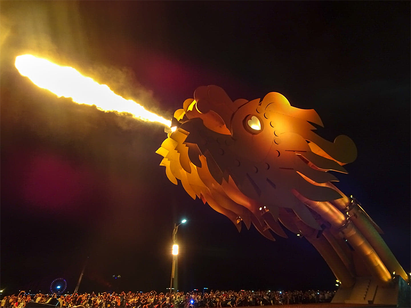 Dragon Bridge breathing fire over the Han River at night