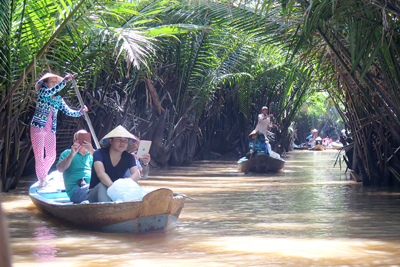 Boat on a waterway in the Mekong Delta