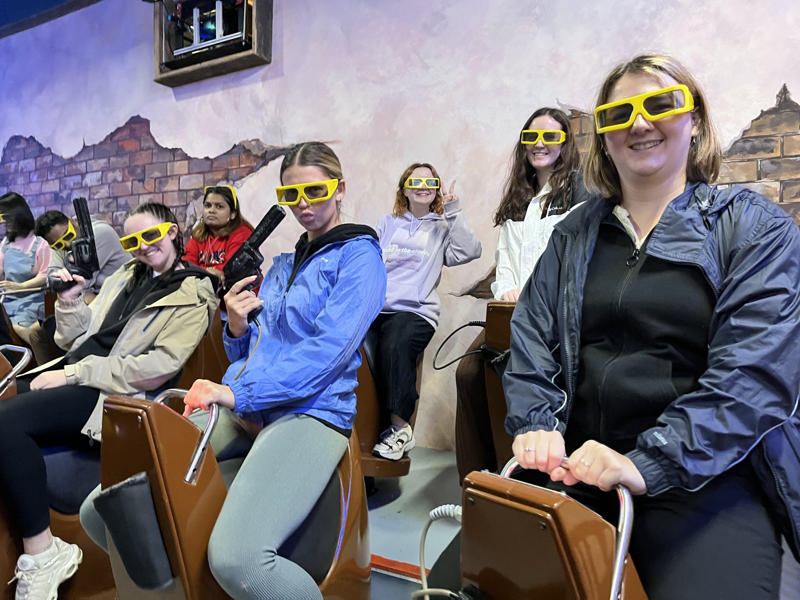 Guests in 3D glasses on a ride in the Fantasy Park games zone at Ba Na Hills