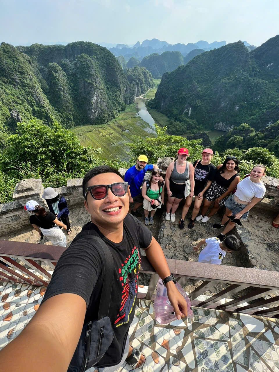 Kevin and guests at the top of Hang Mua, looking over Tam Coc, Ninh Binh