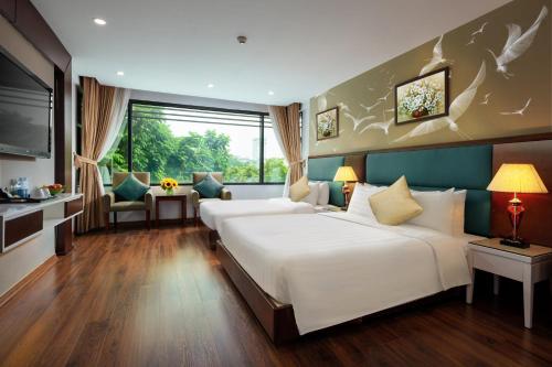 A twin room in a boutique hotel in Hanoi's Old Quarter