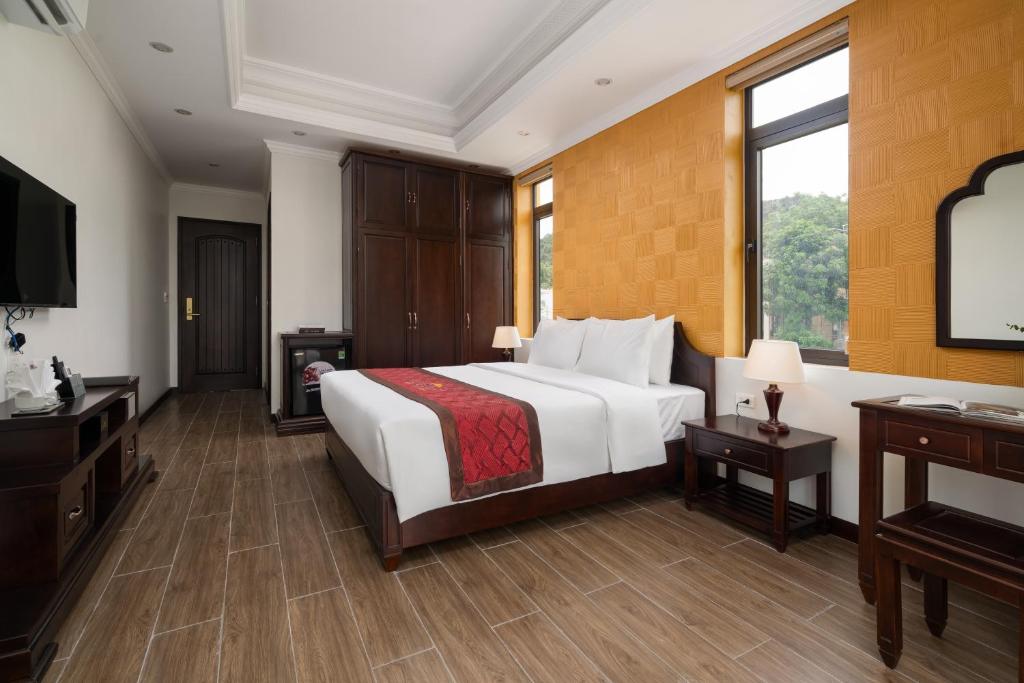 A small hotel surrounded by limestone karsts near Tam Coc, Ninh Binh