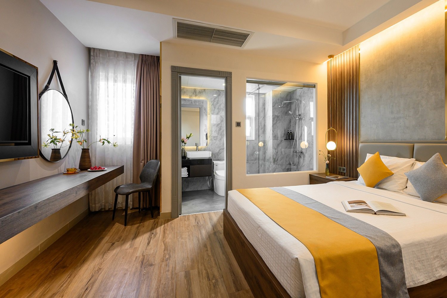 A hotel room overlooking the skyline of District 1 in Ho Chi Minh City